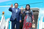 PM Pham Minh Chinh and his spouse (Photo: VNA)
