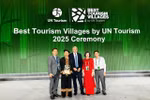 Representatives of Tuyen Quang province and organising committee pose for photo after Lô Lô Chải is honoured one of best tourism villages in 2025. — (Photos courtesy of Tuyen Quang province) 