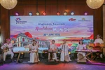 A performance of traditional musical instruments of Vietnam the tourism promotion event in Munich on June 30. (Photo: VNA)