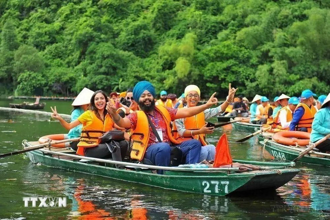 Indian delegates to the 10th Vietnamese - Indian People's Friendship Festival visit the Trang An landscape complex in Ninh Binh province on August 13, 2019. (Photo: VNA) Indian visitors to Vietnam.webp