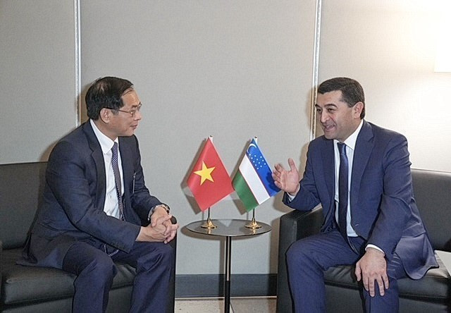 Deputy PM and FM Bui Thanh Son and Uzbekistan FM Bakhtiyor Saidov.jpeg