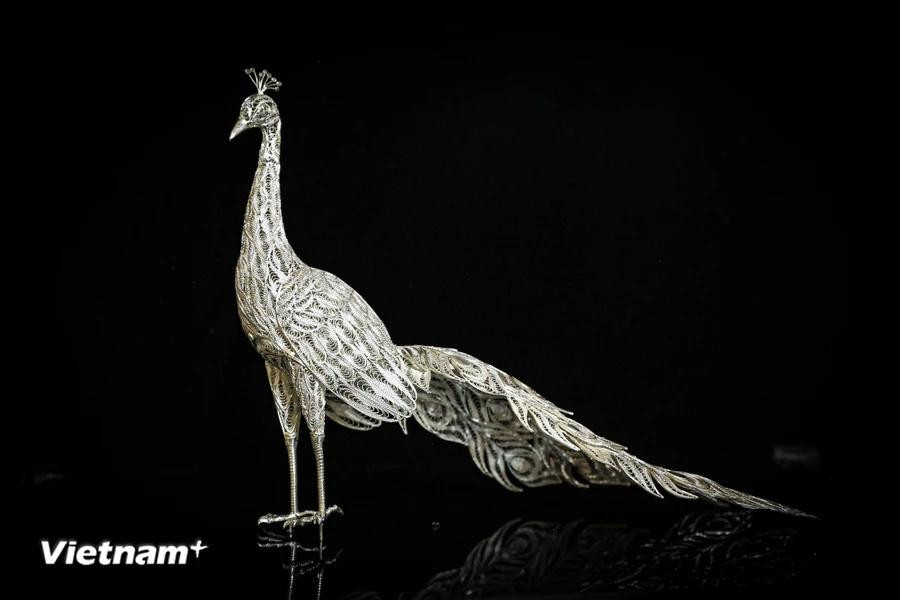 Some products consist of thousands of details, reflecting the meticulousness and diligence of the Dinh Cong silversmithing craft. (Photo: VietnamPlus)