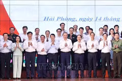 Party General Secretary To Lam and delegates pose for a group photo. (Photo: VNA)
