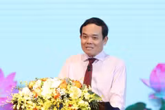 Deputy Prime Minister Tran Luu Quang speaks at the event. (Photo: VNA)
