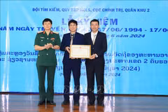 At the ceremony to mark 30th founding anniversary of the team held in Oudomxay province, Laos on June 17 (Photo: VNA)
