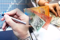  Malaysian economy grows at slowest pace in nearly two years