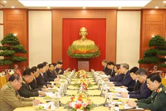 The talks between General Secretary of the LPRP Central Committee and State President Thongloun Sisoulith and his Vietnamese counterpart To Lam (Photo: VNA)
