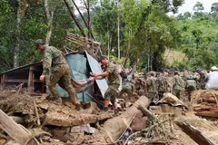Race against time to find landslide victims in Quang Nam