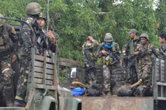 Philippine forces kill four Abu Sayyaf suspects 