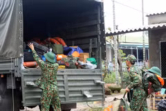 Rescue teams approach isolated power plants by waterway, road routes