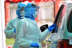 Malaysia partially loosens COVID-19 restrictions