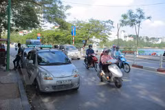 Carpool service GrabShare makes debut in HCM City