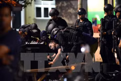Suspected militant shot dead after stabbing Indonesian policemen 
