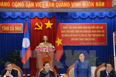 Laos’ top legislator encourages local cooperation