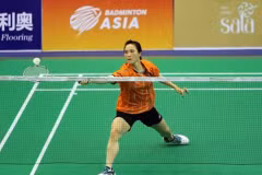 Trang enters second round of Asian badminton tourney