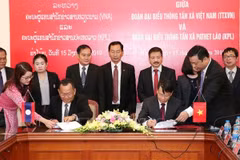 Heartfelt relations between news agencies of Vietnam, Laos