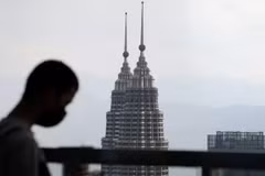 COVID-19 darkens Malaysia’s 2021 economic outlook