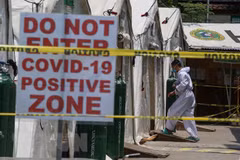 Philippines extends restrictions, Laos concerned about COVID-19 community transmission
