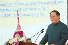 Lao Prime Minister Sonexay Siphandone speaks at the opening ceremony of The Thatluang Festival and Laos Trade Fair 2024 on November 11 in Vientiane. (Photo: VNA)