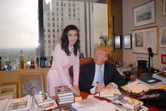 Kim Hong takes a photo with Donald Trump. (Photo courtesy of Kim Hong)