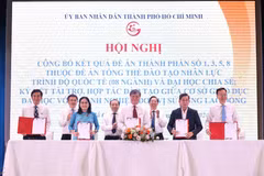 Agencies sign agreements to implement the project at the conference. (Photo: VNA)