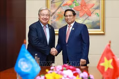 Prime Minister Pham Minh Chinh (R) and UN Secretary-General Antonio Guterres (Photo: VNA)