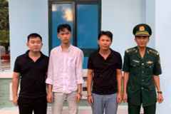 The three men (left) are arrested while attempting to exit Vietnam illegally. (Photo: VNA)