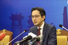 Deputy Minister of Foreign Affairs Do Hung Viet chairs a press conference announcing Vietnam's national report on human rights protection and promotion (Photo: VNA)