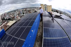 Solar panels on the roof of the headquarters of the Go Vap Power Company in Ho Chi Minh City (Photo: VNA)