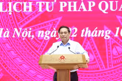 Prime Minister Pham Minh Chinh speaks at the online conference to implement the expansion of the electronic health record system and the issuance of judicial record certificates via the app VNeID nationwide. (Photo: VNA)