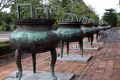 Photo: Cuu dinh” (Nine Dynastic Urns) are placed in front of the Hien Lam Pavilion inside The To Temple in the Hue Imperial Citadel (Dai Noi) for over 200 years. (Photo: VNA)