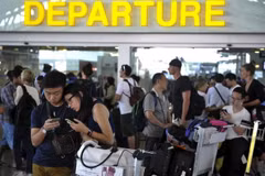 Volcanic ash forces Indonesian airport closure, seven killed in Filipi