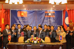 Vietnamese, Lao home affairs ministries boost cooperation 