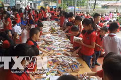 Nearly 3,000 book titles donated to poor children in Lao Cai