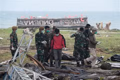 Indonesian rescuers use drones as tsunami death toll rises