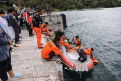 Indonesia police suspect criminal offence behind capsized boat
