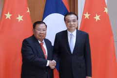 China willing to step up cooperation with Laos