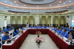 Son La, Lao provinces exchange experience in trade union work