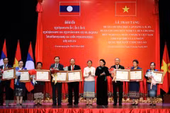Friendship orders presented to Lao NA collectives, individuals 