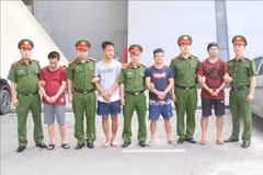 Vietnam hands over four wanted suspects to China