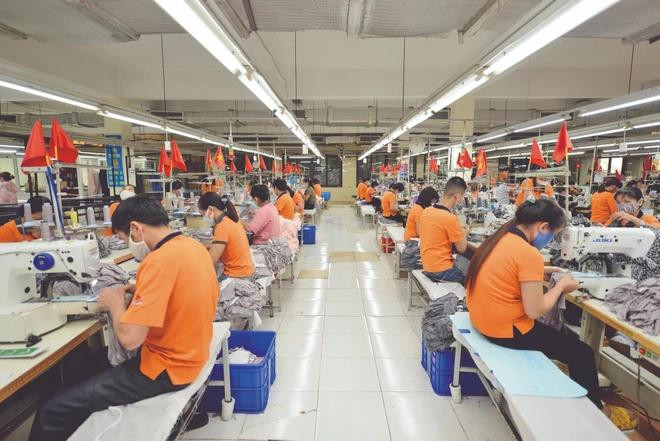 Businesses take advantage of market opportunities to boost export. (Photo: VietnamPlus) xuatkhau.webp