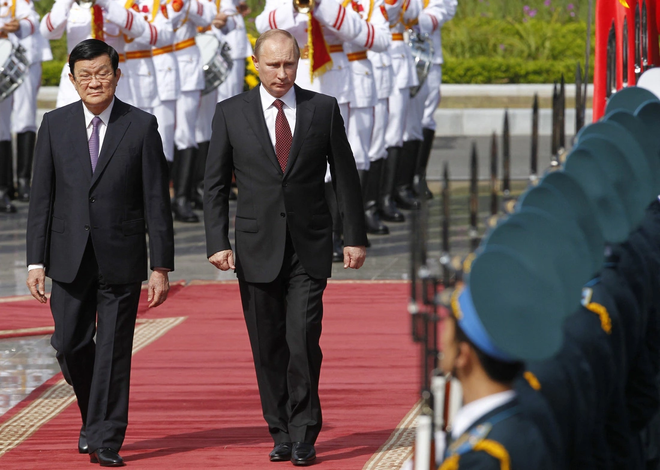 The Russian President pays a state visit to Vietnam in 2013 at the invitation of President Truong Tan Sang. (Photo: AFP) Truong Tan Sang and Putin.png