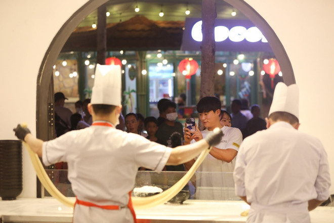 Korean visitors at Vui Phet night market in Sunset Town, Phu Quoc Sun Group 3.jpg