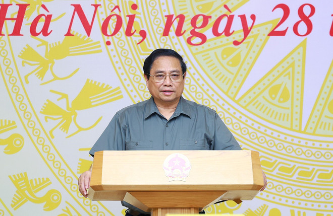 PM Pham Minh Chinh speaks at the conference. (Photo: VNA) PM.jpg