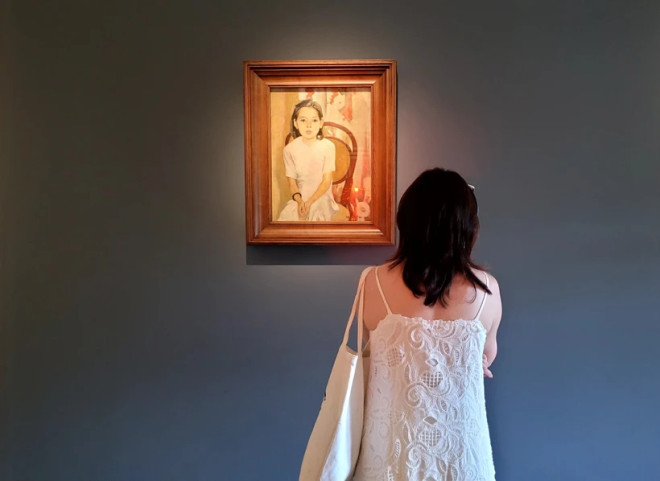 "Em Thuy" (Little Sister Thuy) – national painting treasure is displayed at the Vietnam Fine Arts Museum. (Photo: Minh Anh/Vietnam+) em thúy.jpg