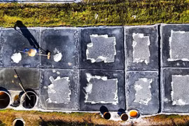 Salt farmers endure the heat to preserve timeless craft