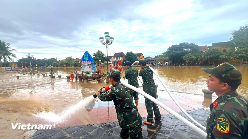 Four high-capacity pumps are used to clean the streets. (Photo: VietnamPlus)