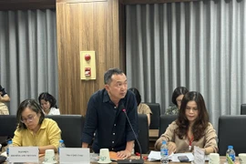 Musician Quoc Trung speaks at the seminar on the development of cultural industries in Vietnam. (Photo: bvhttdl.gov.vn)