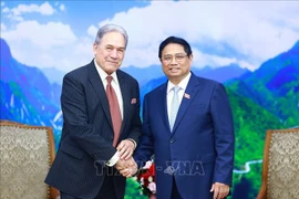 PM Pham MInh Chinh (R) and Deputy Prime Minister and Minister of Foreign Affairs of New Zealand Winston Peters (Photo: VNA)