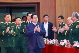 PM Pham Minh Chinh visits the National Defence Academy on December 12. (Photo: VNA)